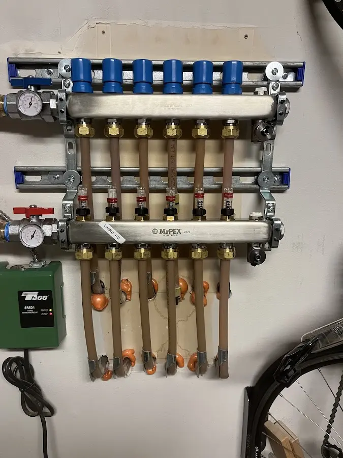 Plumber performing Water Heater Repair at a residential property in Luray